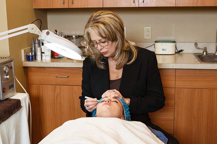 Staff with Patient in Exam Room